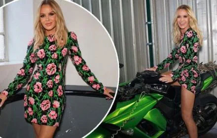 Amanda Holden looks glam  as she straddles a motorbike in a floral mini dress