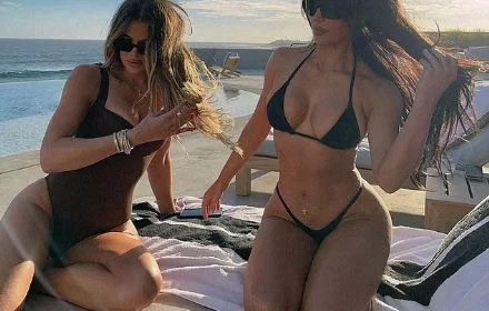 Kim Kardashian and sister Khloe displays their knockout swimsuit bodies as they wrap their LEGS around each other in sunkissed Los Cabos vacation snaps