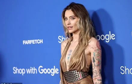 Paris Jackson  steals the show in plunging gold dress with a thigh-high slit as she attends the Fashion Trust US Awards in Hollywood