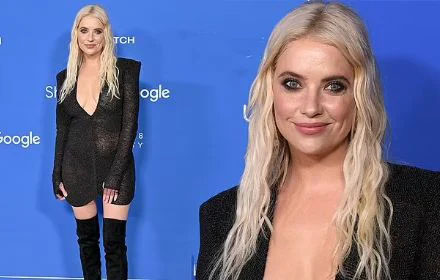 Spring Breakers star Ashley Benson looks incredible  in plunging sheer black jumpsuit and over the knee black boots at Fashion Trust US Awards