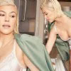 The blonde bombshell Kourtney Kardashian looks like Marilyn Monroe as she  poses in lingerie and heels to promote Lemme